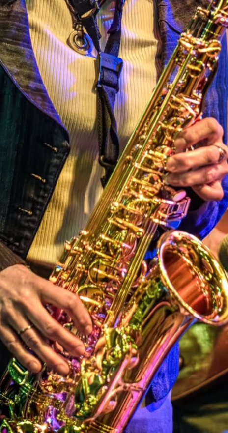 Maggan playing the saxophone